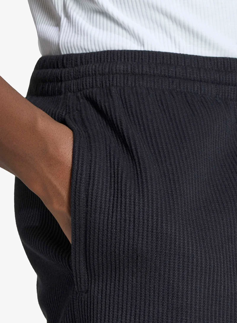 Adidas Originals BLACK Trefoil Essential Waffle Shorts for Men | Best Price UAE