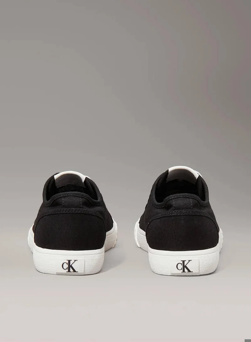 Calvin Klein Jeans Ck Black/Bright White Canvas Low Profile Trainers for Men | Best Price UAE