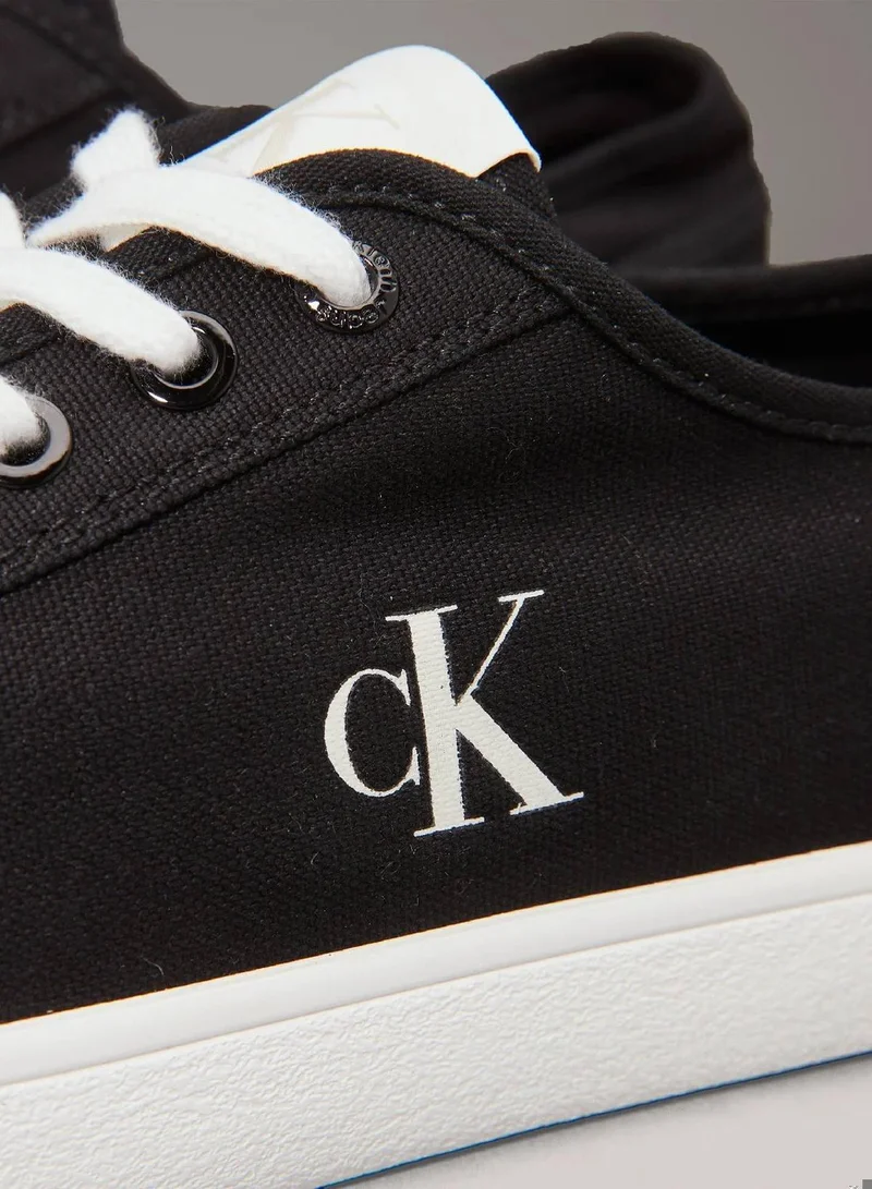 Calvin Klein Jeans Ck Black/Bright White Canvas Low Profile Trainers for Men | Best Price UAE