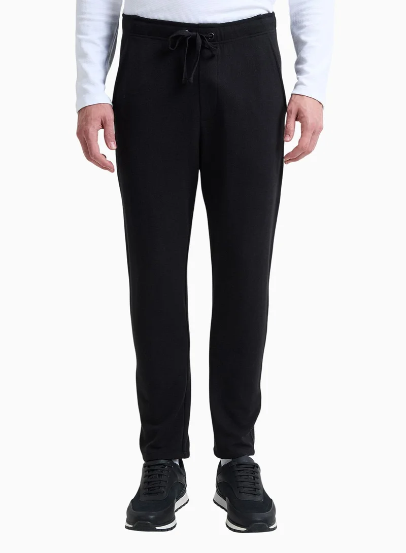 فرنش كونكشن بنطلون رياضي ذكي بنسيج قماشي بمسامير