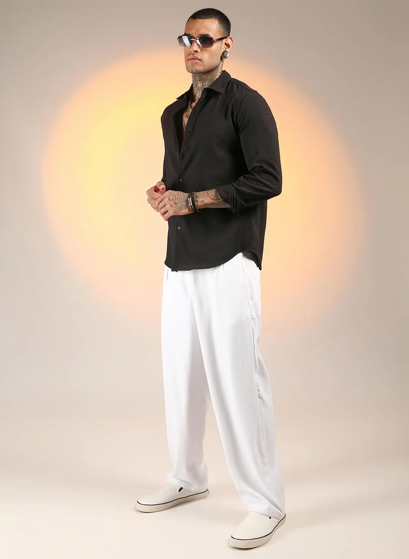 Campus Sutra Campus Sutra Men's Midnight Black Solid Seersucker Shirt For Casual Wear | Spread Collar | Long Sleeve | Button Closure | Shirt Crafted With Comfort Fit For Everyday Wear