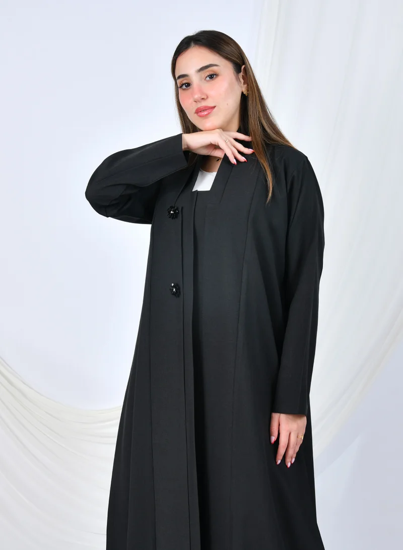 HAWRAA ABAYA Black formal abaya with a simple A-line design, embellished with floral buttons for a feminine touch