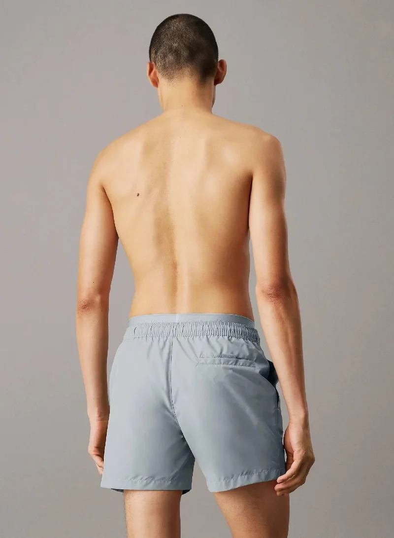 Calvin Klein Quarry Double Waistband Swim Shorts - CK Meta Legacy for Men | Best Price UAE
