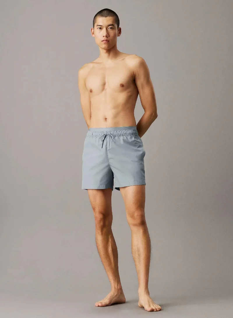 Calvin Klein Quarry Double Waistband Swim Shorts - CK Meta Legacy for Men | Best Price UAE