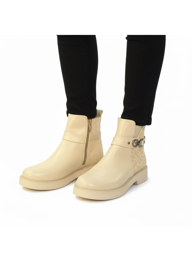 Stylish women's boots with a side pattern and elegant design, equipped with a metal strap. - Image 1