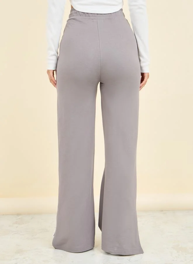 Styli Drawstring Waistband Fit and Flare Jogger with Side Slit