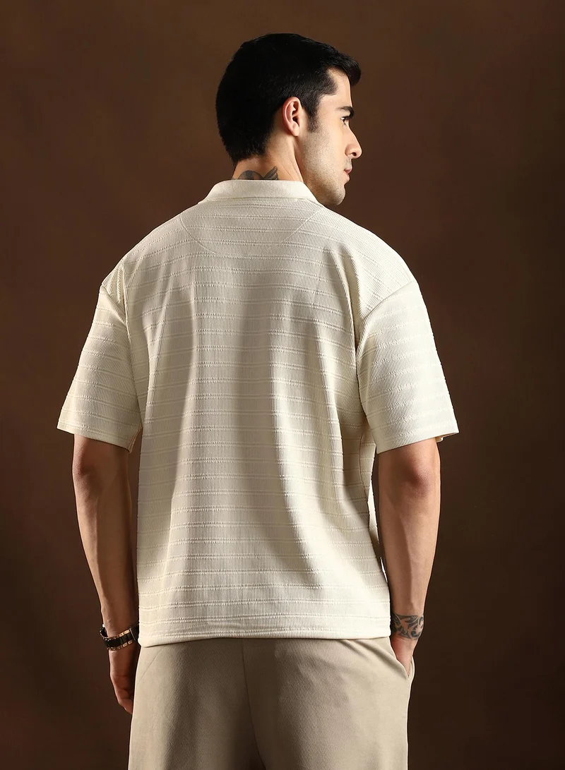 Campus Sutra Campus Sutra Men's Cream White Coil-Tactile Cuban Polo T-Shirt For Casual Wear | Polo Neck | Short Cuffed Sleeves | Half-Button Closure | T-Shirt Crafted With Comfort Fit For Everyday Wear