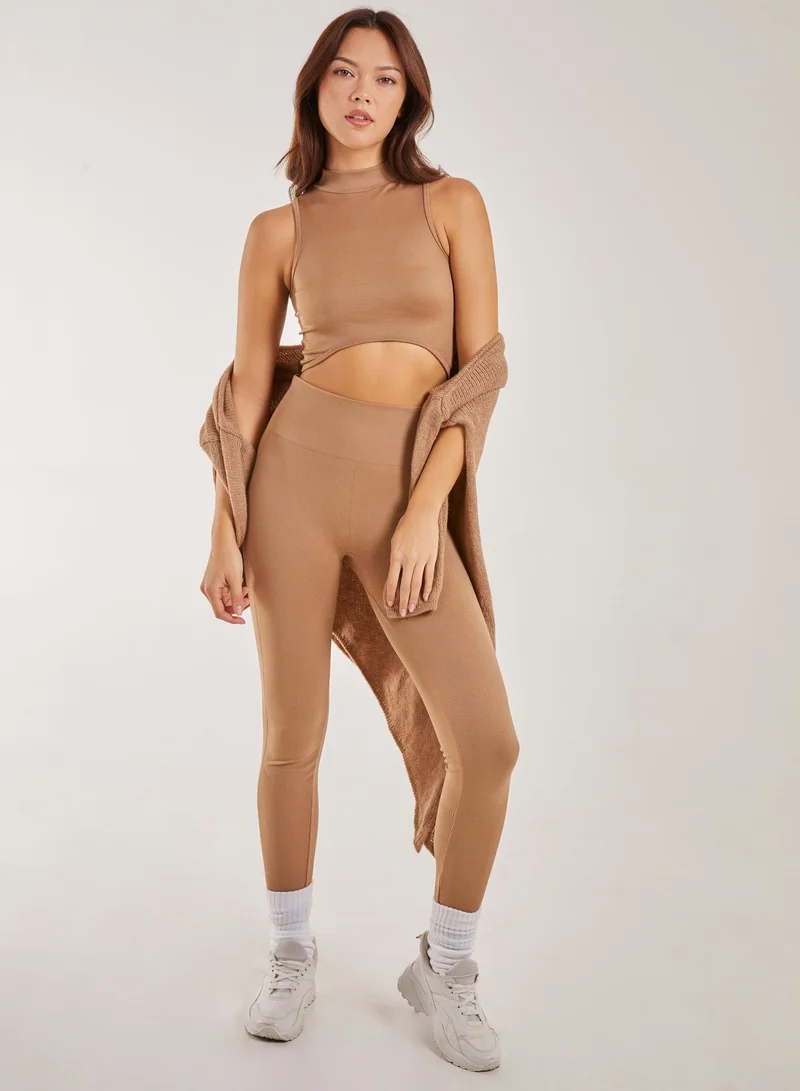 بينك فانيلا بلوزة قصيرة بدون أكمام بياقة عالية مضلعة