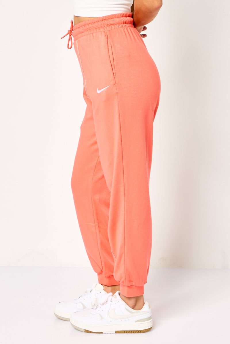 Nike Women Loose Fit Embroidered Logo Outdoor Sweatpants, Dark Peach - Image 3