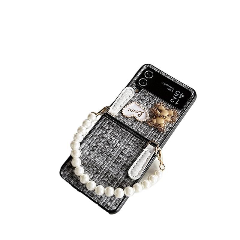 PC Protective Case for Samsung Galaxy Z Flip 4 with Flip Design and Pearl Chain plus Heart Pattern plus Leather Texture in Black - Image 1
