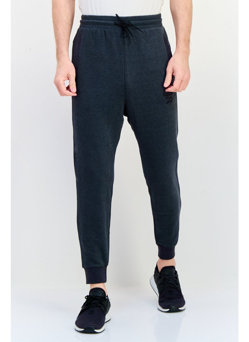 Reebok Men Sportswear Fit Outdoor Sweatpants, Black  - Image 1