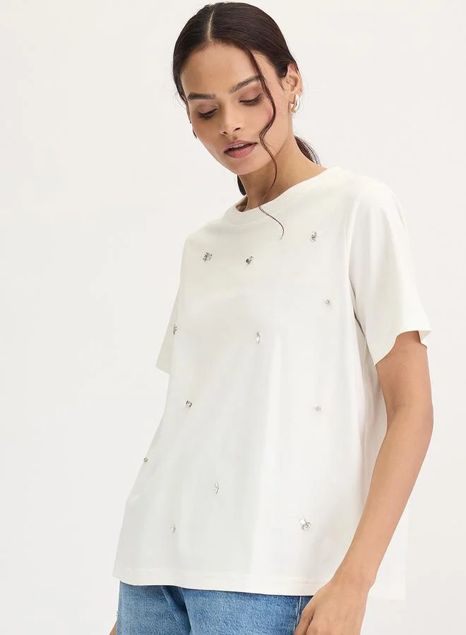 Femmella  White Rhinestone Embellished Short Sleeve T-Shirt for Women | Best Price UAE
