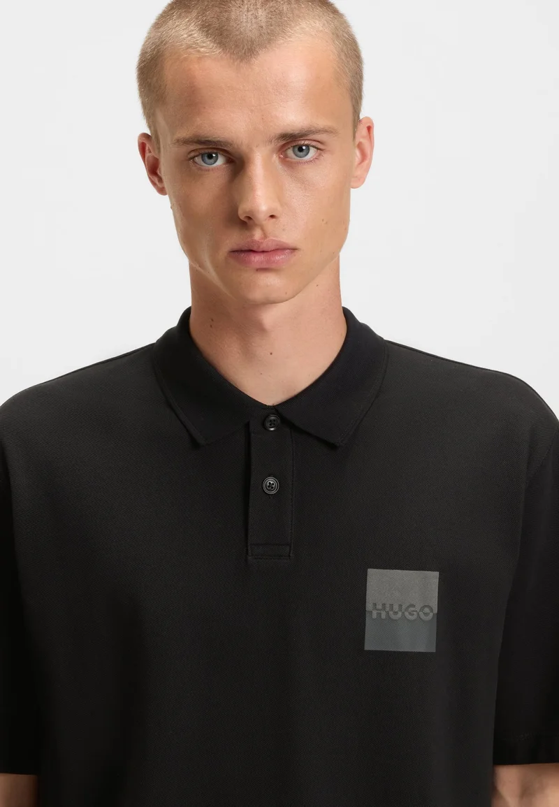 HUGO Relaxed-fit polo shirt in cotton with split logo