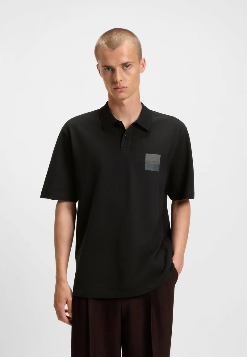 HUGO Relaxed-fit polo shirt in cotton with split logo