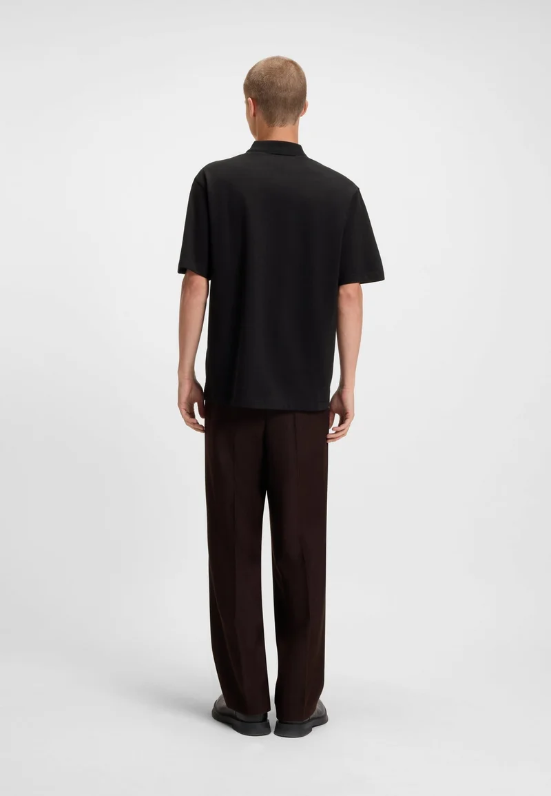 HUGO Relaxed-fit polo shirt in cotton with split logo