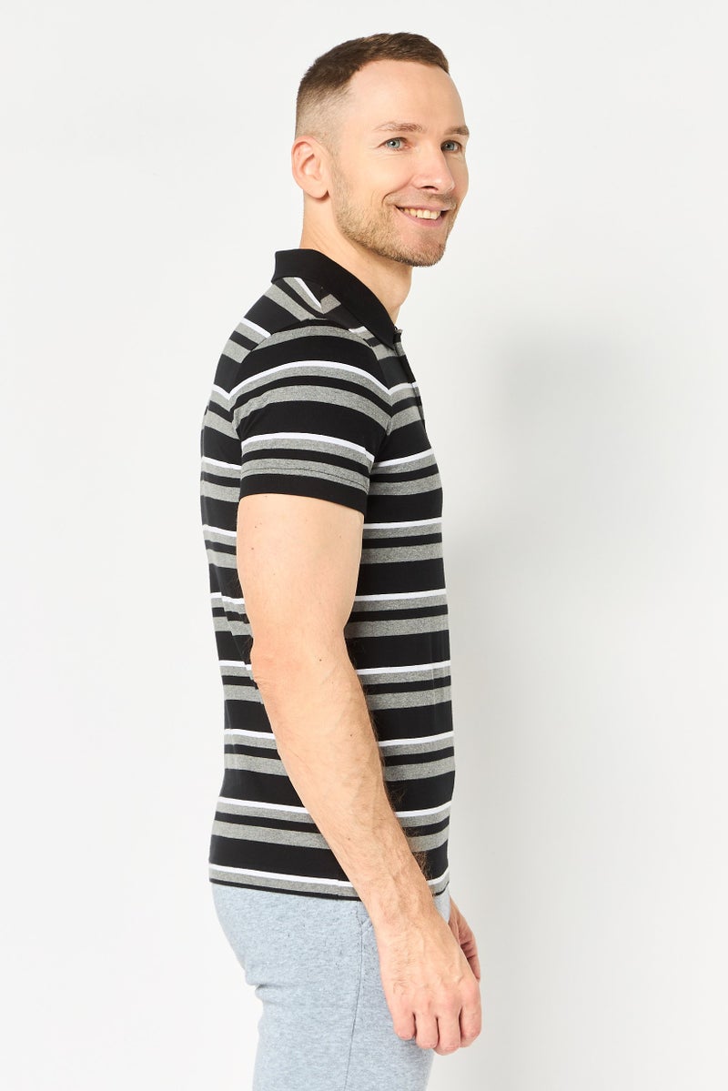 PUMA قميص بولو خارجي أساسي بأكمام قصيرة للرجال بقصة ضيقة، متعدد الألوان - Image 3