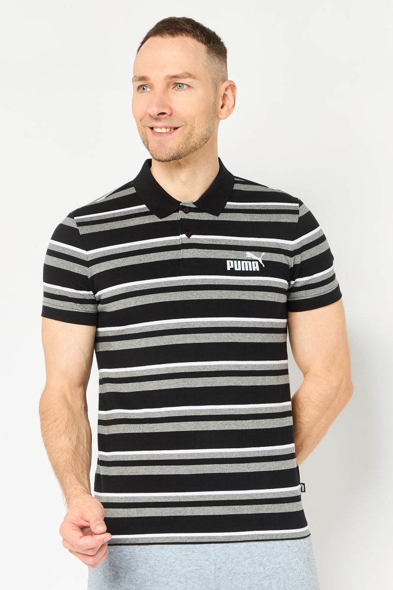 PUMA قميص بولو خارجي أساسي بأكمام قصيرة للرجال بقصة ضيقة، متعدد الألوان - Image 1