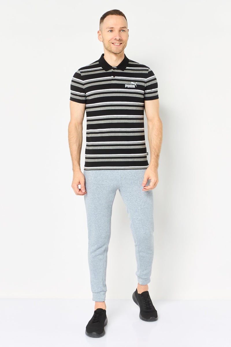 PUMA قميص بولو خارجي أساسي بأكمام قصيرة للرجال بقصة ضيقة، متعدد الألوان - Image 2