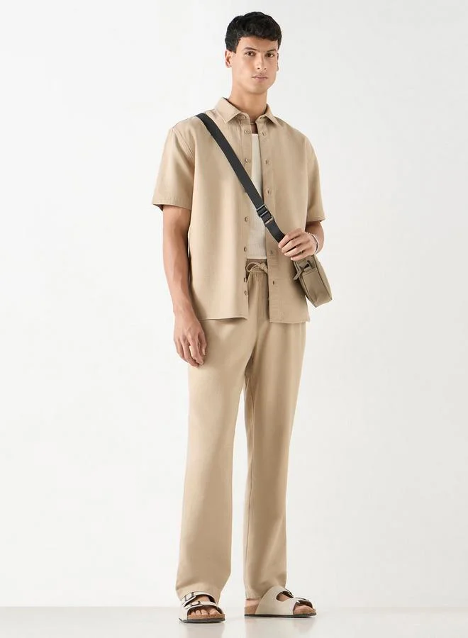 ايكونيك قميص بارز الملمس بأكمام قصيرة من آيكونيك