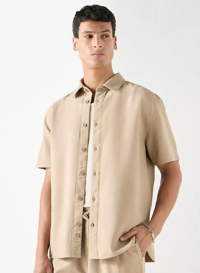 ايكونيك قميص بارز الملمس بأكمام قصيرة من آيكونيك