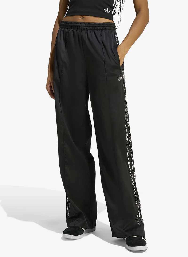 اديداس اوريجينالز بنطلون رياضي فضفاض بطبعة طائر النار اللؤلؤي