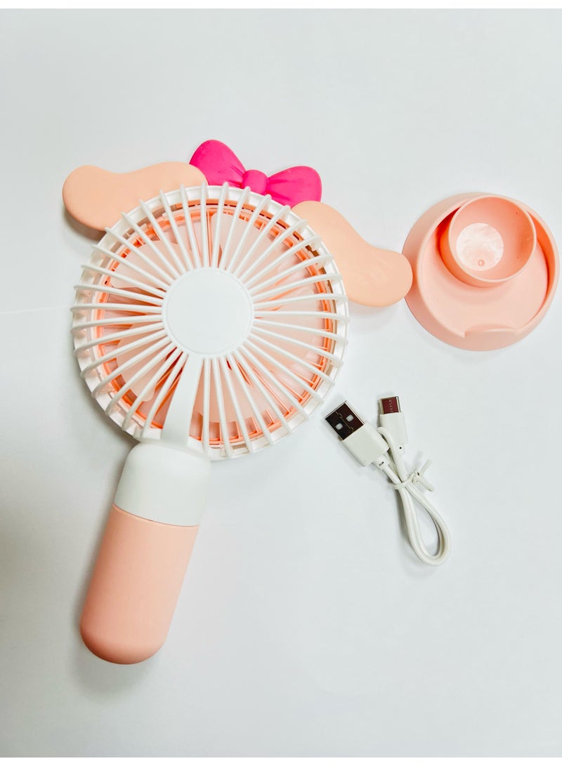 راكسوم مروحة يدوية، مروحة طاولة صغيرة، مروحة يدوية شخصية محمولة قابلة لإعادة الشحن مزودة بمنفذ USB، مع حامل للسيارة والتخييم في الهواء الطلق والمكتب والمنزل والسفر، لون وردي - Image 2