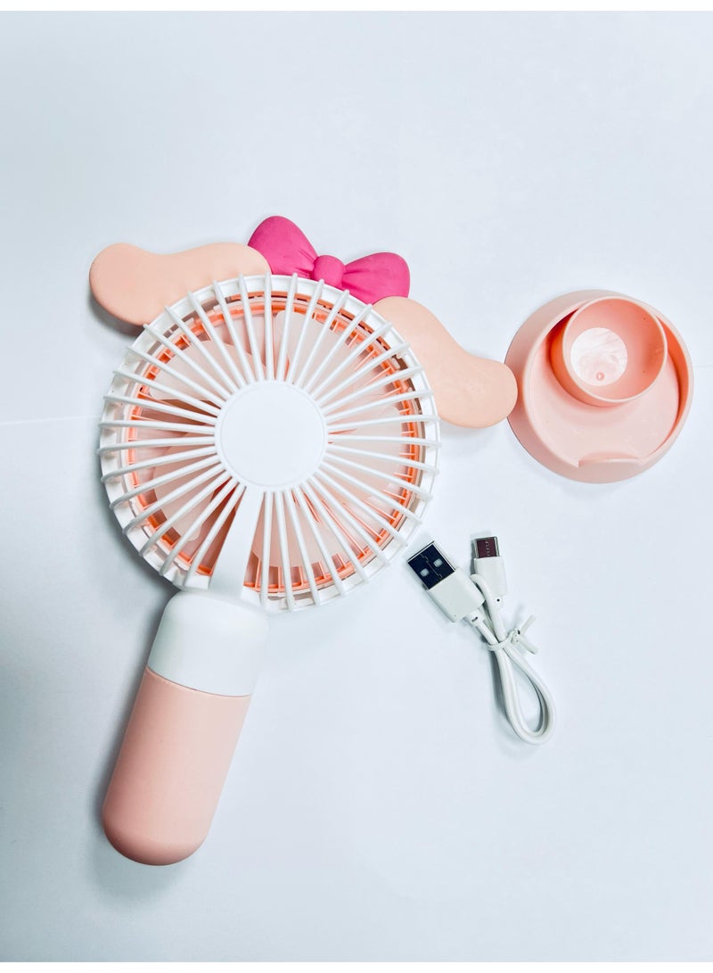 راكسوم مروحة يدوية، مروحة طاولة صغيرة، مروحة يدوية شخصية محمولة قابلة لإعادة الشحن مزودة بمنفذ USB، مع حامل للسيارة والتخييم في الهواء الطلق والمكتب والمنزل والسفر، لون وردي - Image 1