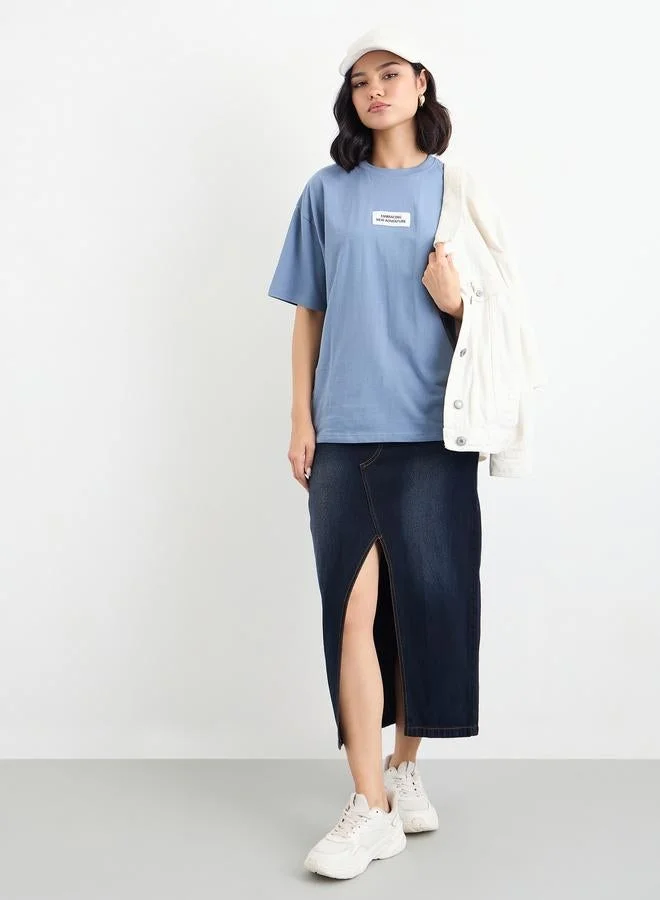 Styli Styli Blue Oversized T-Shirt with Badge Detail