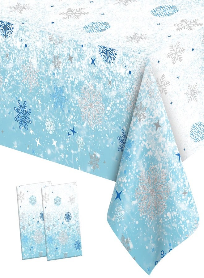 QIHOMPIB 2 PCS Blue White Plastic Snowflake Tablecloth(54x108 Inch) Frozen Birthday Winter Wonderland Decorations Disposable Table Cover Tablecloths for Christmas Holiday New Year Party Favors Supplies Decor - Image 1