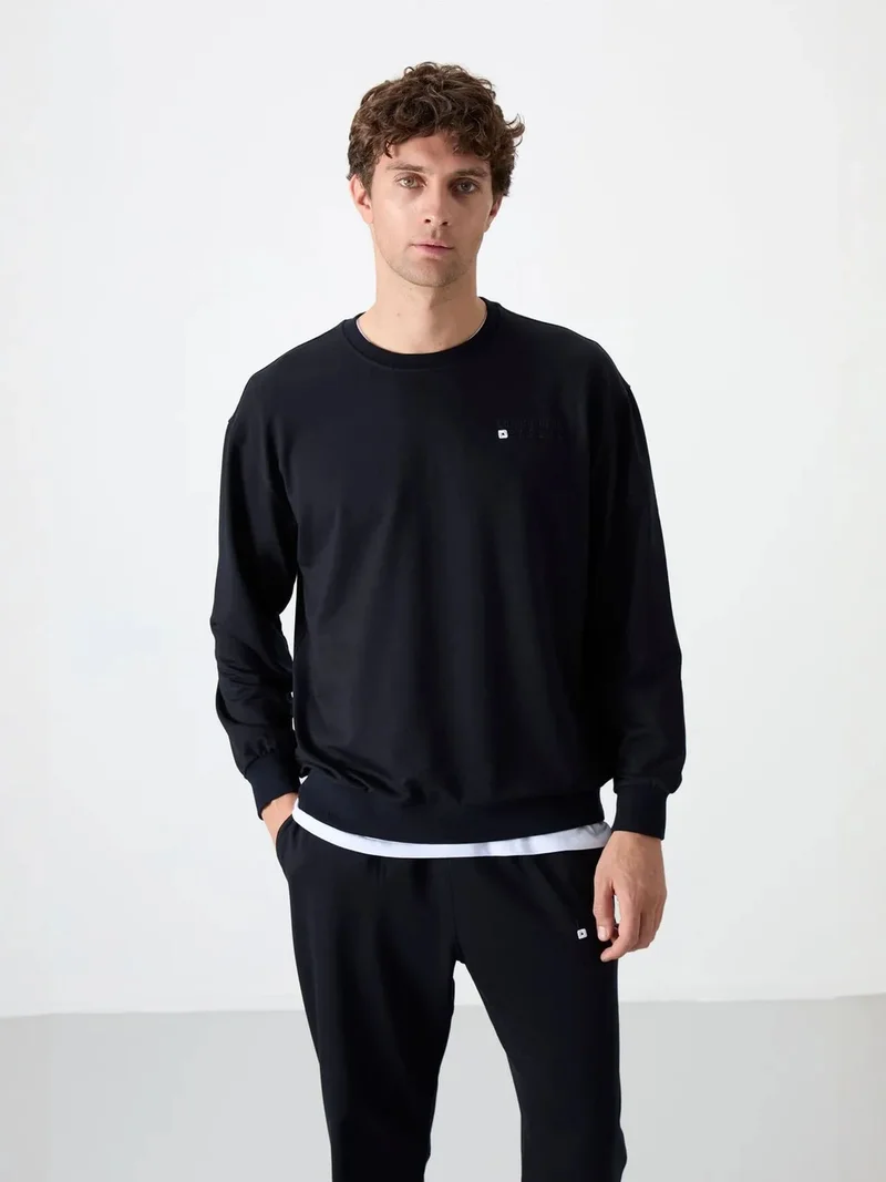 تومي لايف TOMMY Men's Oversized Sweatshirt And Pants Set