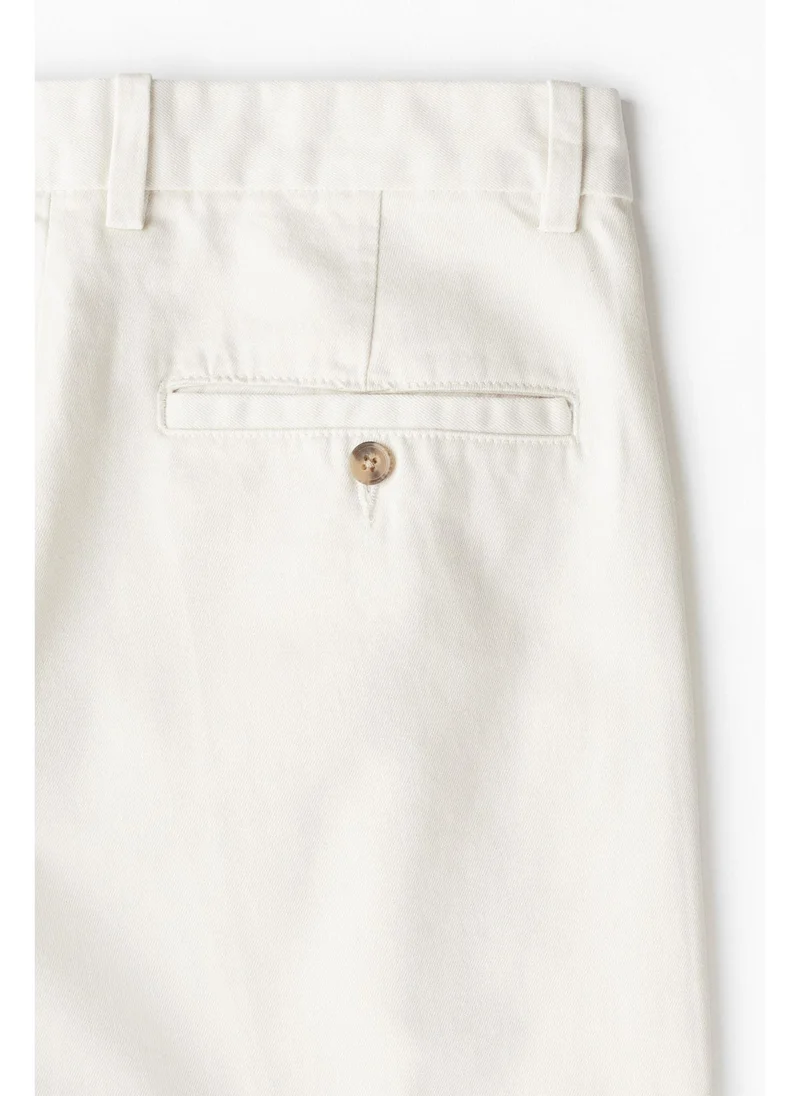 H&M cream Regular Fit Crease-leg chinos for Men | Best Price UAE