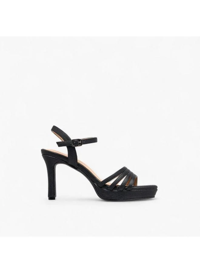 فلورا بيلا من شو إكسبرس صنادل نسائية بكعب عريض بطبعة حيوانات مع إغلاق بإبزيم