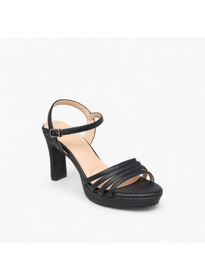 فلورا بيلا من شو إكسبرس صنادل نسائية بكعب عريض بطبعة حيوانات مع إغلاق بإبزيم