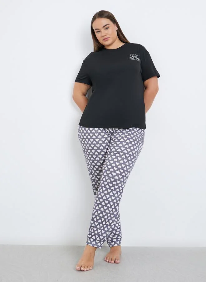Styli Styli Plus Drop Shoulder Slogan T-Shirt and Heart Cuffed Pyjama Set