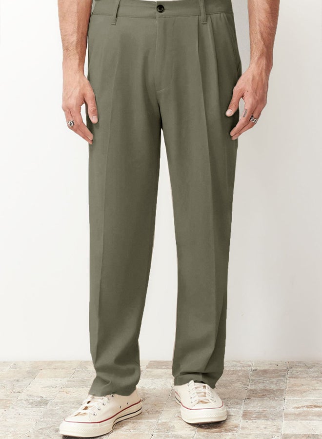 trendyol بنطلون قماش كلاسيكي فضفاض بليسيه باللون الكاكي - Image 1