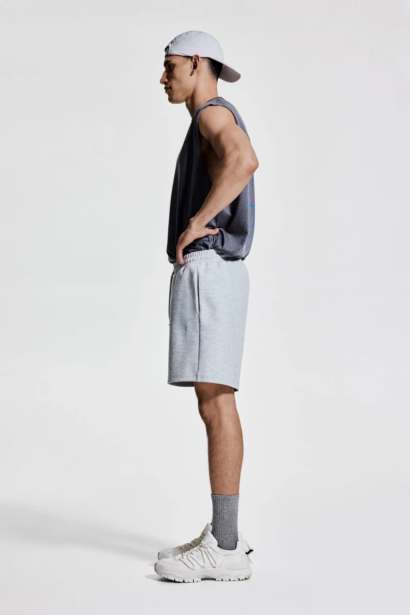 H&M Mid-length sports shorts with DryMove™