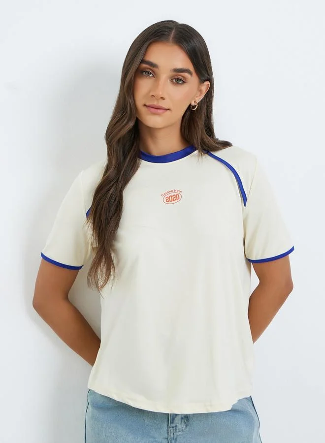 Styli Women Beige Graphic Print Oversized T-Shirt