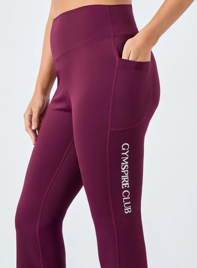 Styli Active purple Gymspire Edition - Label Broad Waist Side Pocket Flared Leggings with Text Detail for Women | Best Price UAE