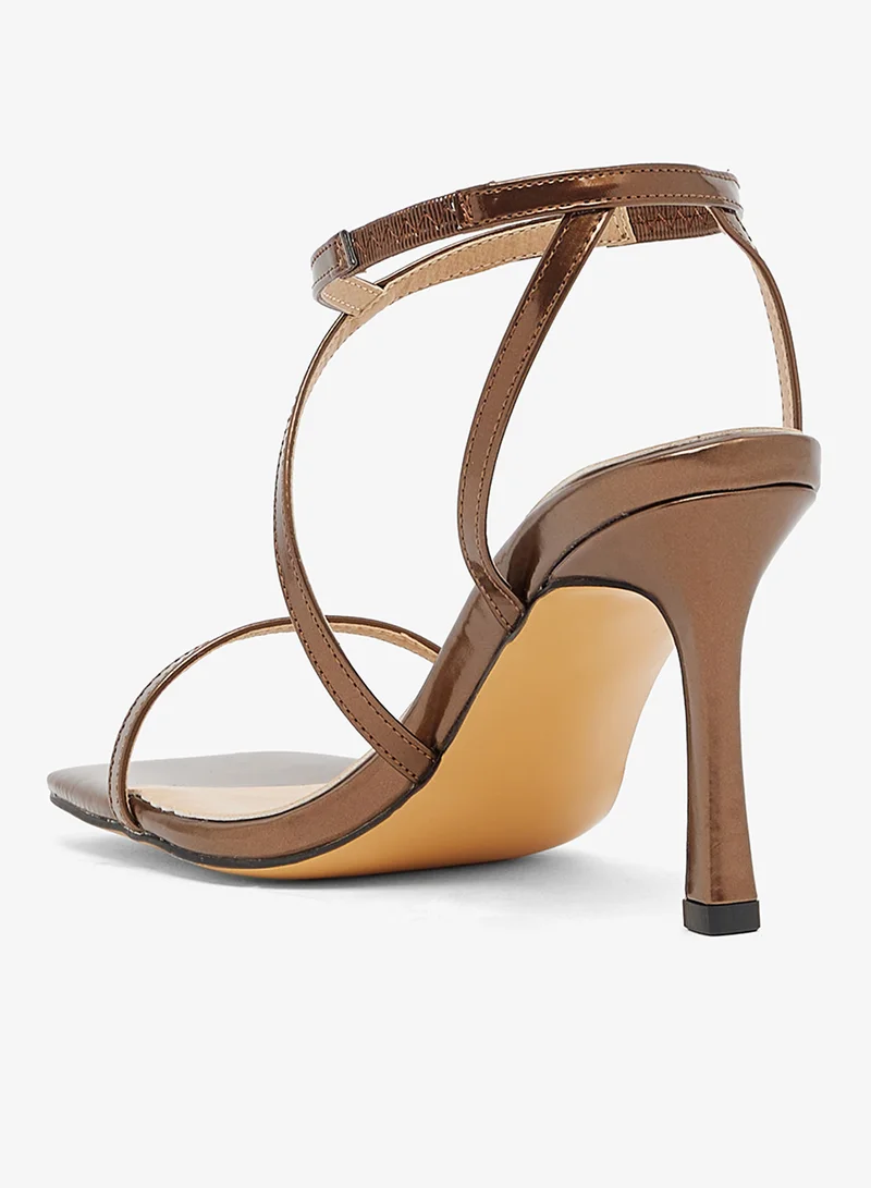 Ella Limited Edition Bronze sandal with asymmetric straps and mid heel