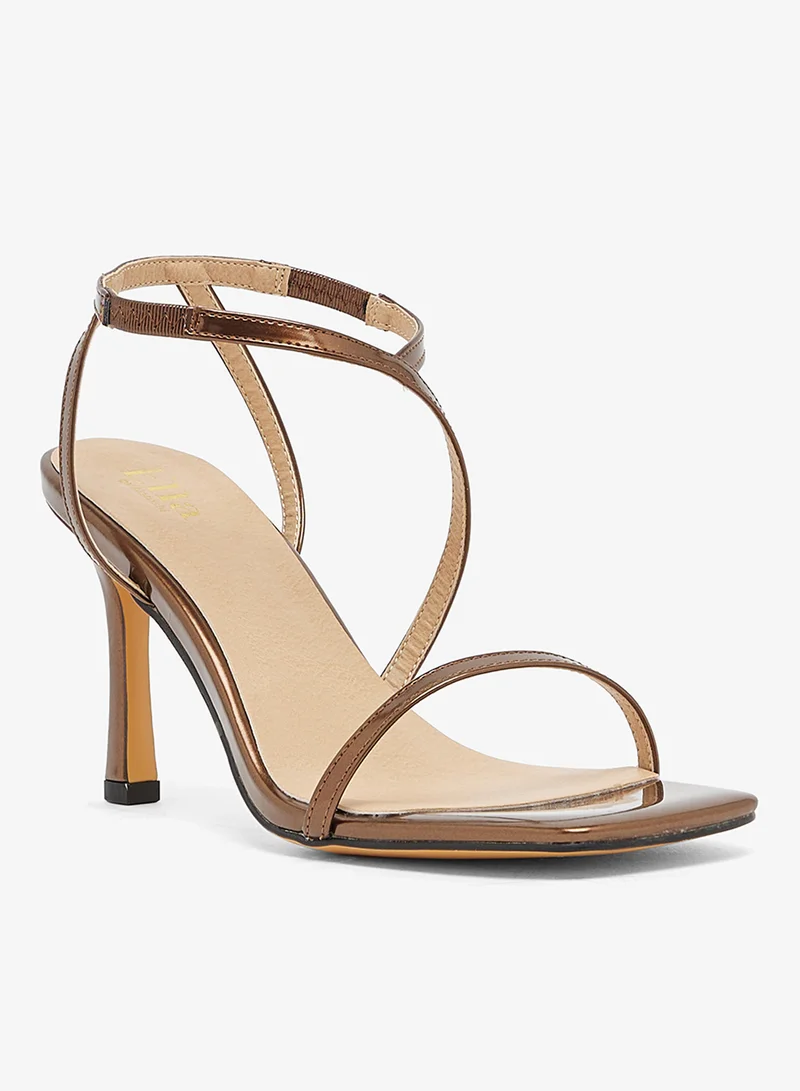 Ella Limited Edition Bronze sandal with asymmetric straps and mid heel