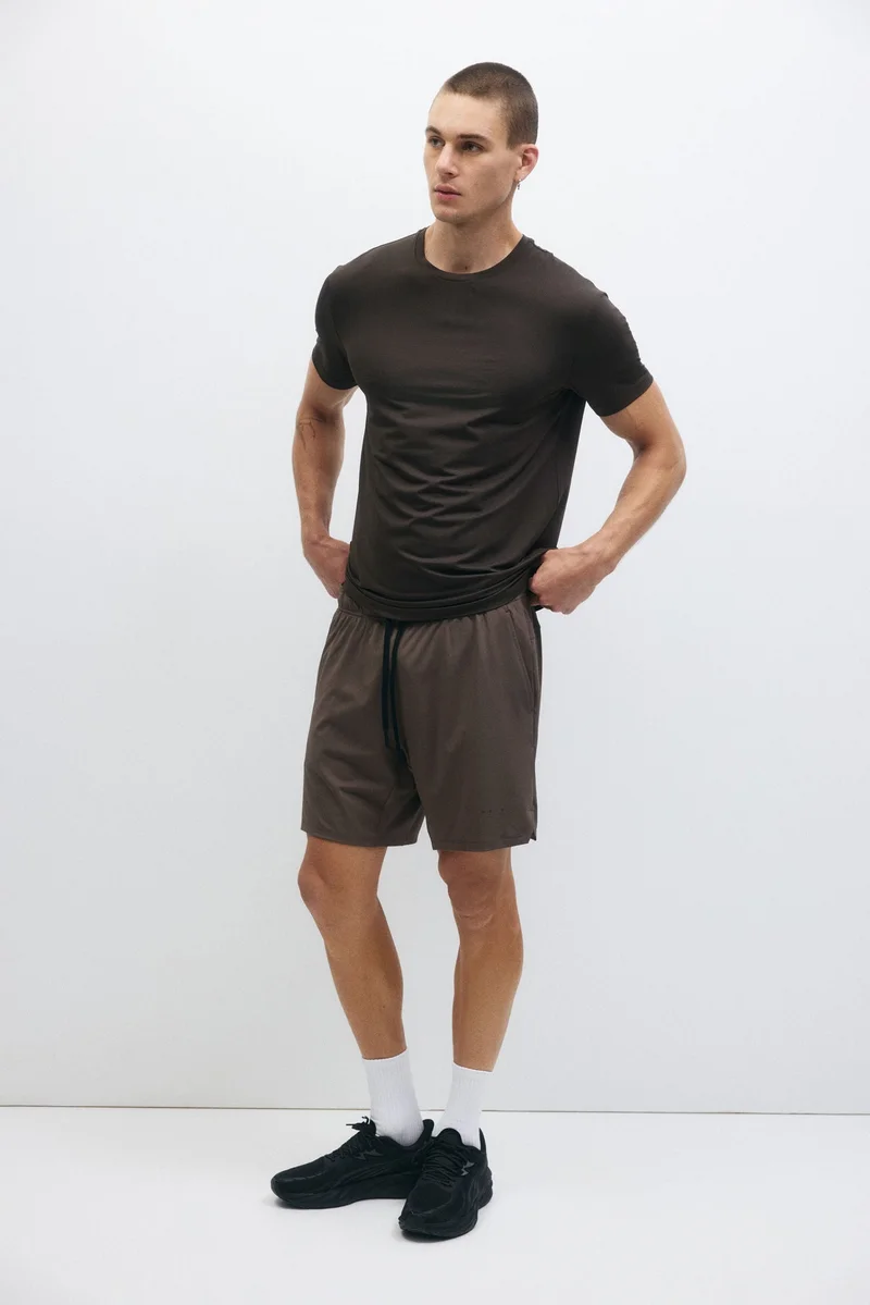 H&M  Muscle Fit Sports top with DryMove™ for Men | Best Price UAE