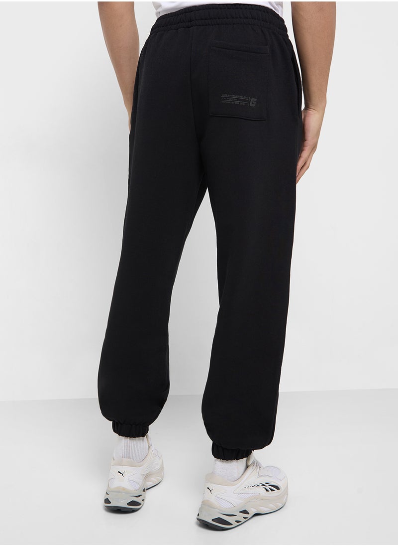 GUESS Drawstring Detailed Cuffed Sweatpants  - Image 3