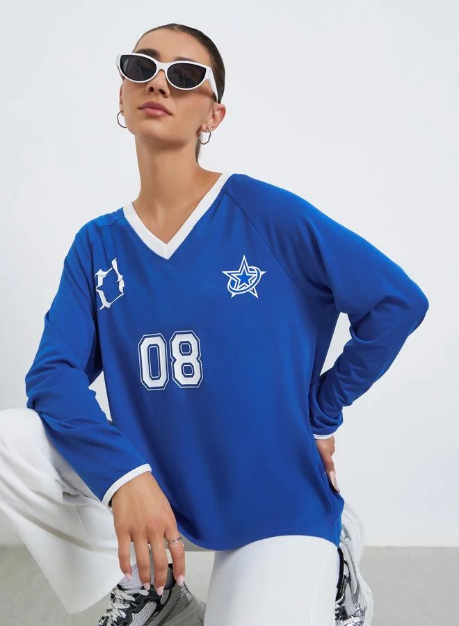 ستايلي تيشيرت بأكمام ريجلان وطبعة جرافيك