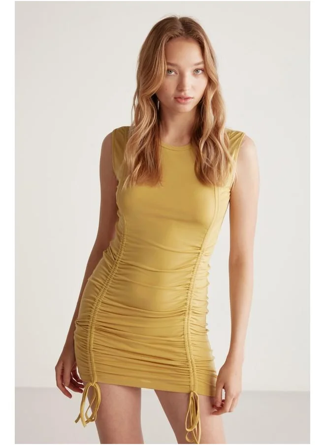GRIMELANGE Grimelange Rachel Women's Draped Skirt Adjustable Length Bodycon Sandy Stretch Fabric Mini Yellow Dress
