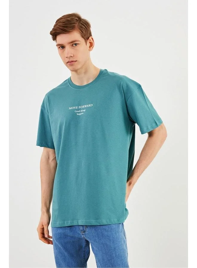 Mmetalic Leo Men's Oversized 100% Cotton Basic Mint T-Shirt with Crew Neck and Print Detail.