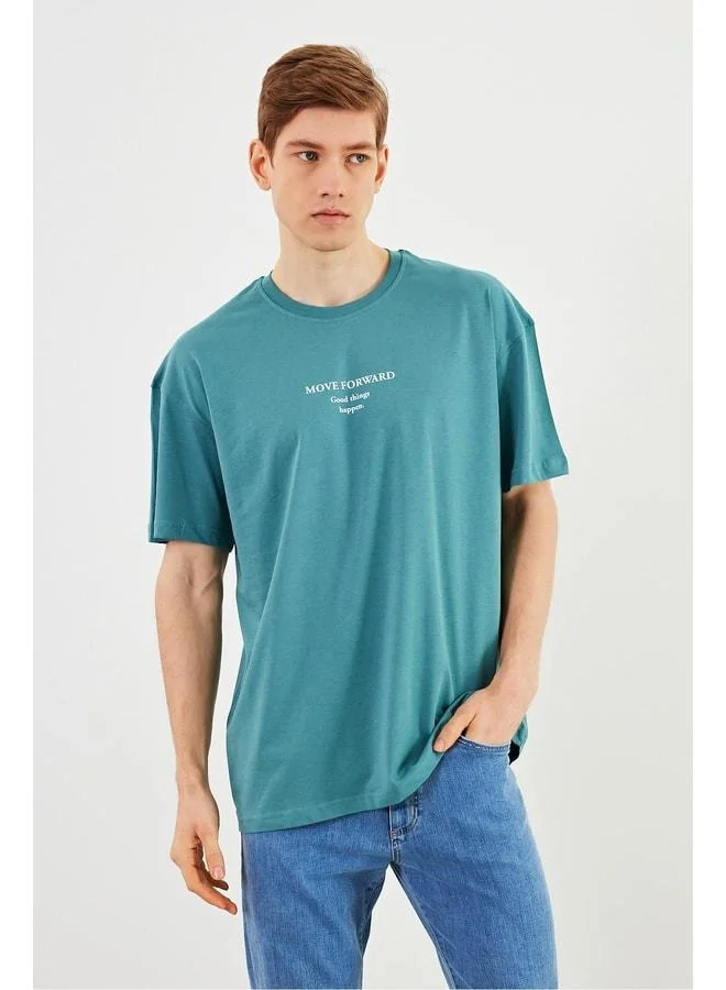 Mmetalic Leo Men's Oversized 100% Cotton Basic Mint T-Shirt with Crew Neck and Print Detail.