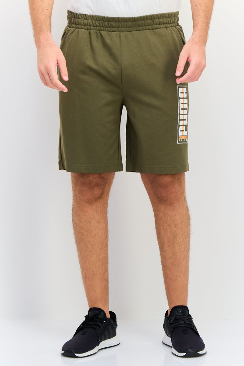 PUMA Men Sportswear Fit Outdoor Shorts, Olive - Image 1