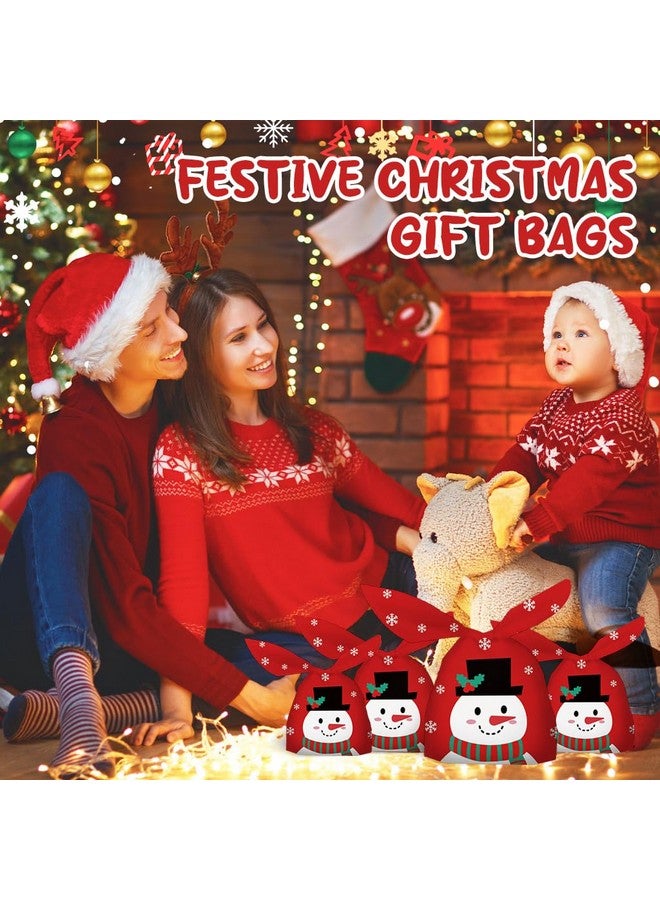HASTHIP حقائب هدايا عيد الميلاد HASTHIP® 50 قطعة حجم صغير ومتوسط زينة عيد الميلاد بطباعة رجال الثلج حقائب هدايا للعودة للأطفال حفلات أعياد الميلاد والعطلات حقائب تغليف هدايا لحفلات عيد الميلاد - أحمر - Image 4