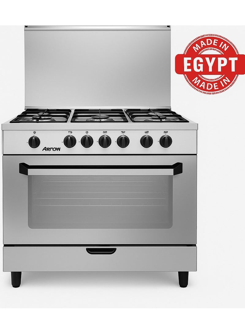 ارو موقد غاز قائم بذاته 90 × 60 سم مع فرن وشواية، 5 شعلات، أمان كامل، مروحة تبريد، دعامة مقلاة من الحديد الزهر، لمسة نهائية من الفولاذ المقاوم للصدأ، باب بإغلاق بكرة. - Image 1