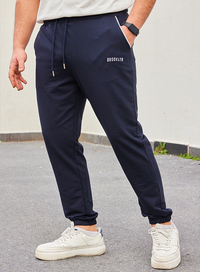 trendyol Navy Blue Regular Fit Printed Elastic Leg Sweatpants TMNSS22EA0121 - Image 5